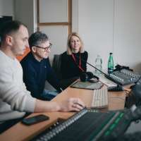 zdjęcie z warsztatów dla zespołów wokalnych przedstawiające ich uczestników