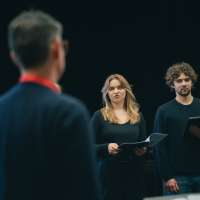 zdjęcie z warsztatów dla zespołów wokalnych przedstawiające ich uczestników