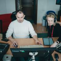 zdjęcie z warsztatów dla zespołów wokalnych przedstawiające ich uczestników